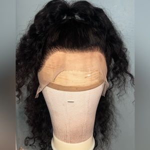 18 inch deep wave human hair wig.